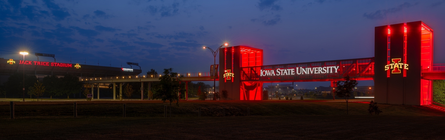 Iowa State Gateway Bridge Jack Trice nighttime Header